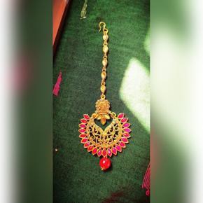 TIKLI FOR GIRL-RED STONE WITH GOLDEN COLOUR TIKLI