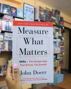 Measure What Matters: OKRs: The Simple Idea that Drives 10x Growth -Paperback