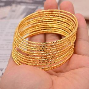 12Pcs Gold Plated Bangles.